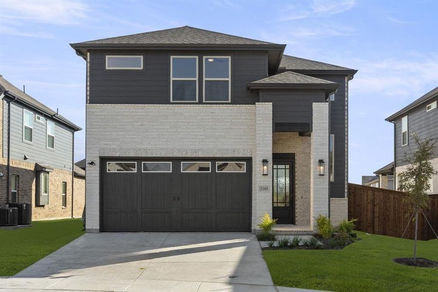 Front exterior of a new home in The Villages of Hurricane Creek, Anna, TX, highlighting curb appeal (Image 2).