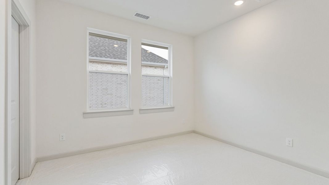 Representative unfurnished interior of a home built from the Toulouse II by Normandy Homes in Rainwater Crossing, Celina (Image 12).