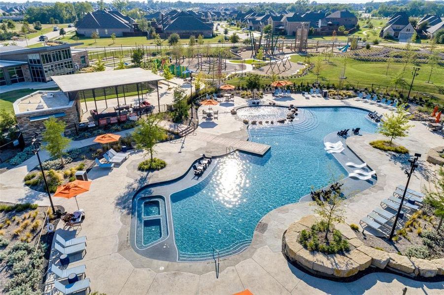 Community pool featuring a patio area Community pool featuring a patio area