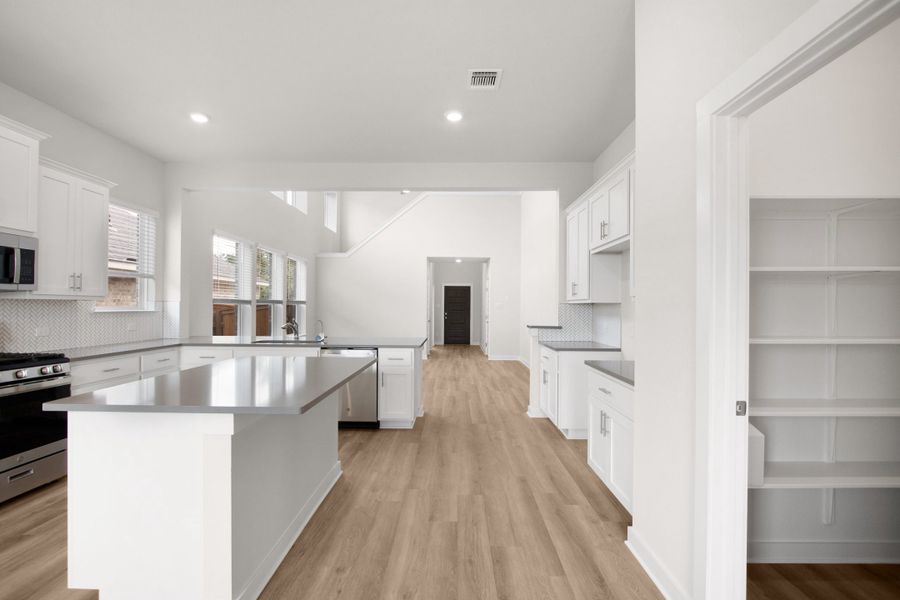 Furnished interior view inside a new home in The Grove at Blackhawk, Pflugerville (Image 61). Furnished interior view inside a new home in The Grove at Blackhawk, Pflugerville (Image 61).