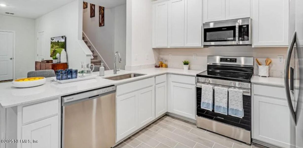 Furnished interior view inside a new home in Silver Falls Townhomes at Silverleaf, St. Johns (Image 15).
