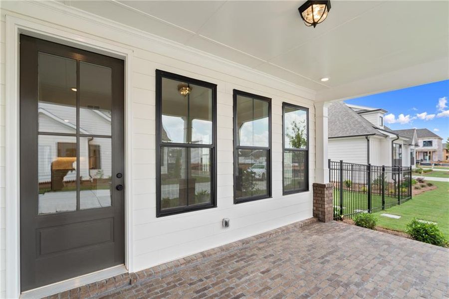 Exterior details and patio area of a home in Promenade at Sawnee Village, Cumming (Image 3).