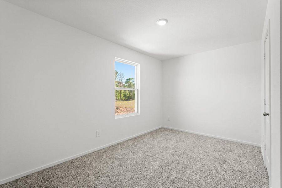 Spacious, unfurnished interior of a new home in New Waverly Station, New Waverly (Image 15). Spacious, unfurnished interior of a new home in New Waverly Station, New Waverly (Image 15).