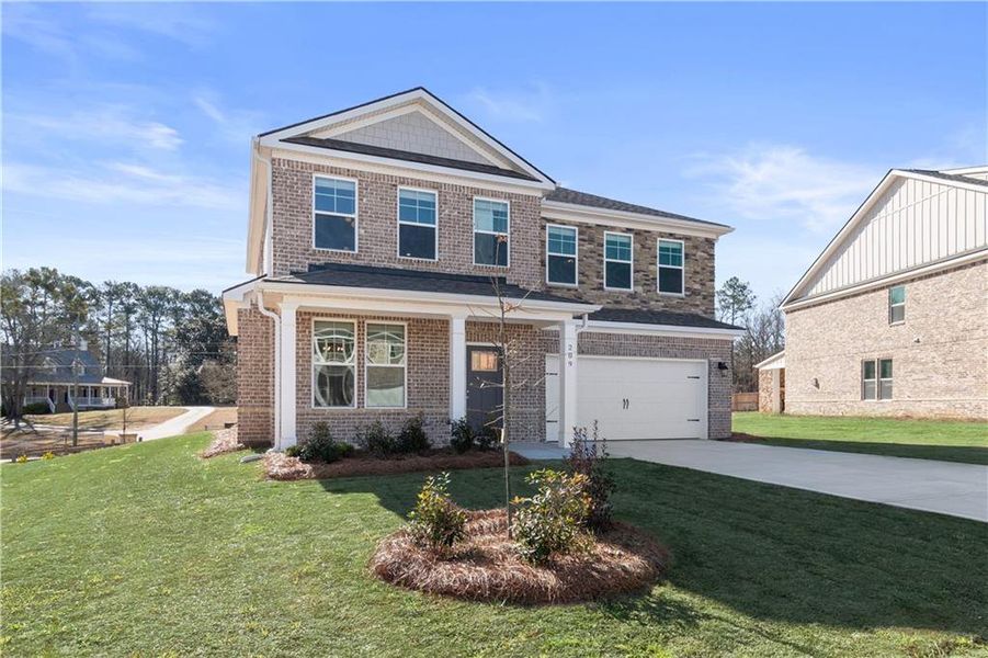 Front exterior of a new home in Kingston, Locust Grove, GA, highlighting curb appeal (Image 21).