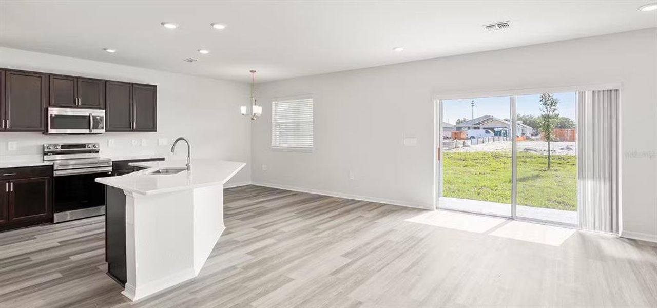Furnished interior view inside a new home in , Winter Haven (Image 6). Furnished interior view inside a new home in , Winter Haven (Image 6).