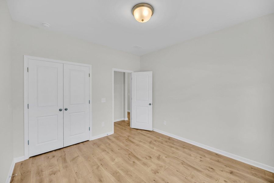 Spacious, unfurnished interior of a new home in Sweetgrass Station, Summerville (Image 12).