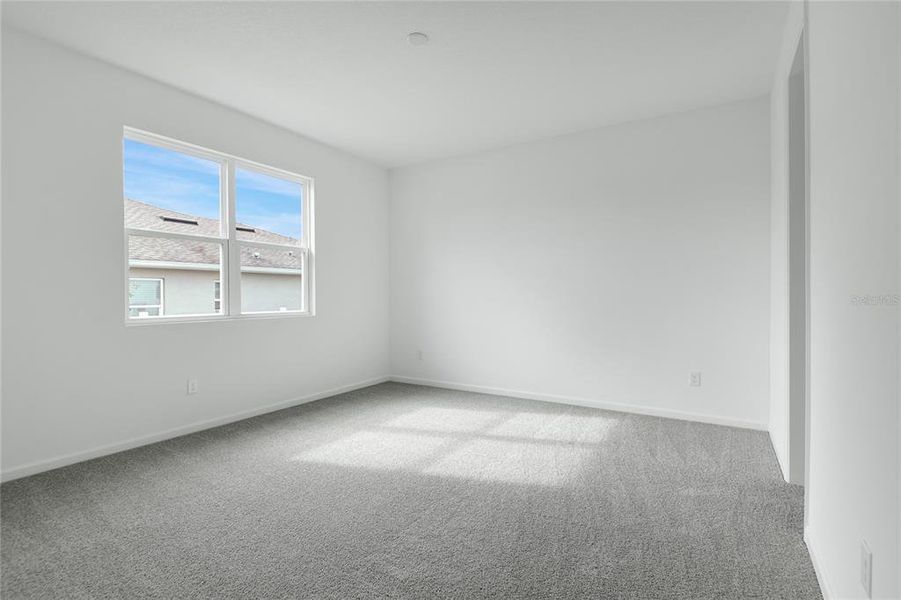 Spacious, unfurnished interior of a new home in Seasons at Grandview Gardens, Deland (Image 15).