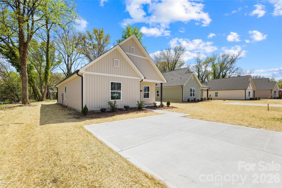 Front exterior of a new home in , Rock Hill, SC, highlighting curb appeal (Image 22).