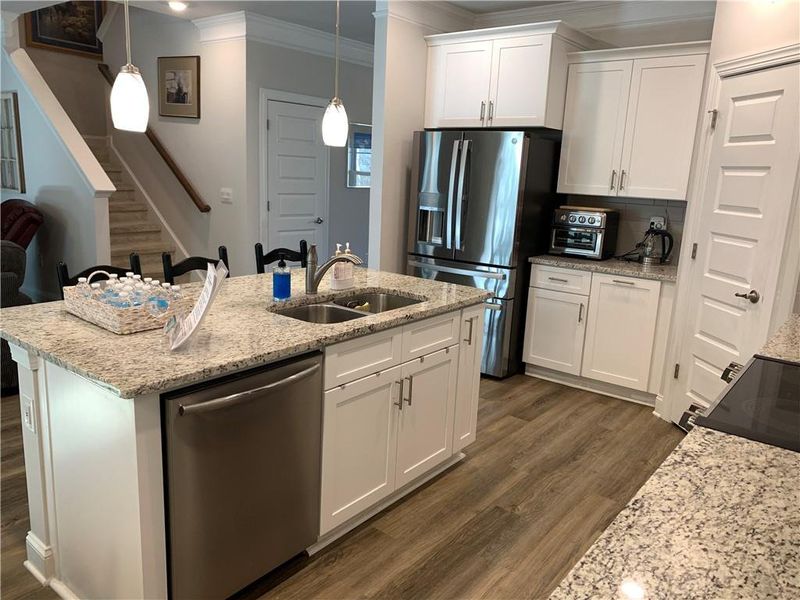 Furnished interior view inside a new home in Holiday Pines, Buford (Image 6).