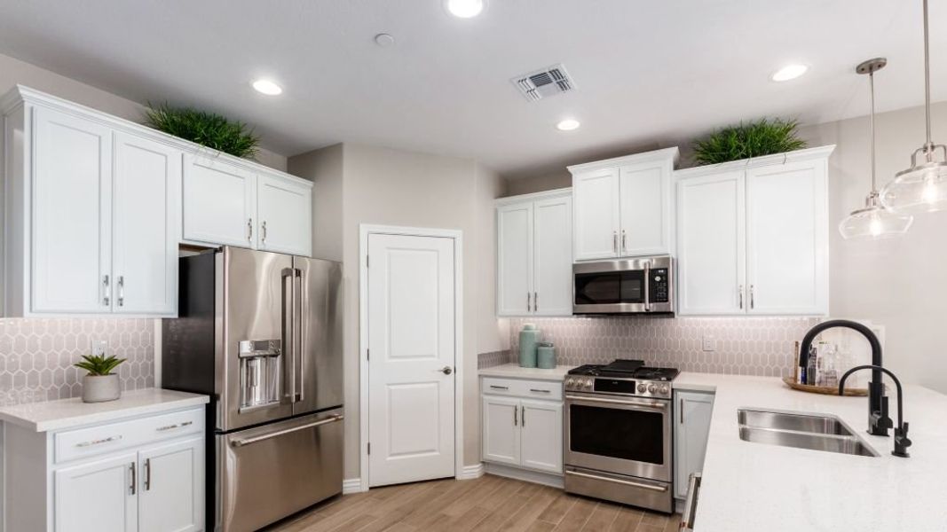 Representative furnished interior of a home built from the Champlain by Taylor Morrison in Mystic Discovery Collection, Peoria (Image 60). Representative furnished interior of a home built from the Champlain by Taylor Morrison in Mystic Discovery Collection, Peoria (Image 60).