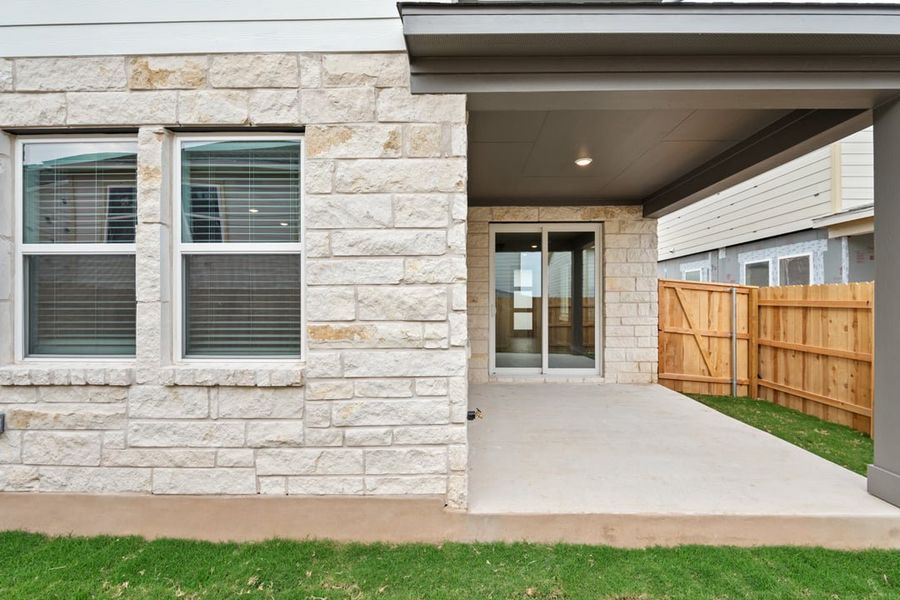 Exterior details and patio area of a home in Union Collection at Park Central, Georgetown (Image 30).