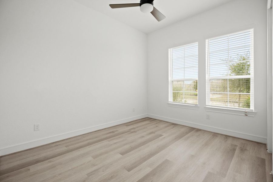 Spacious, unfurnished interior of a new home in Westland Ranch - 70' Homesites, League City (Image 13).