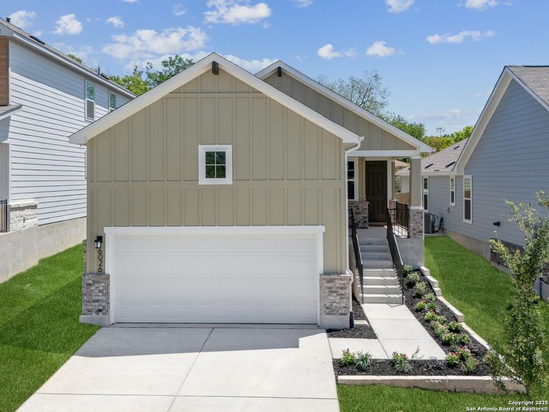 Front exterior of a new home in Avondale, San Antonio, TX, highlighting curb appeal (Image 1). Front exterior of a new home in Avondale, San Antonio, TX, highlighting curb appeal (Image 1).