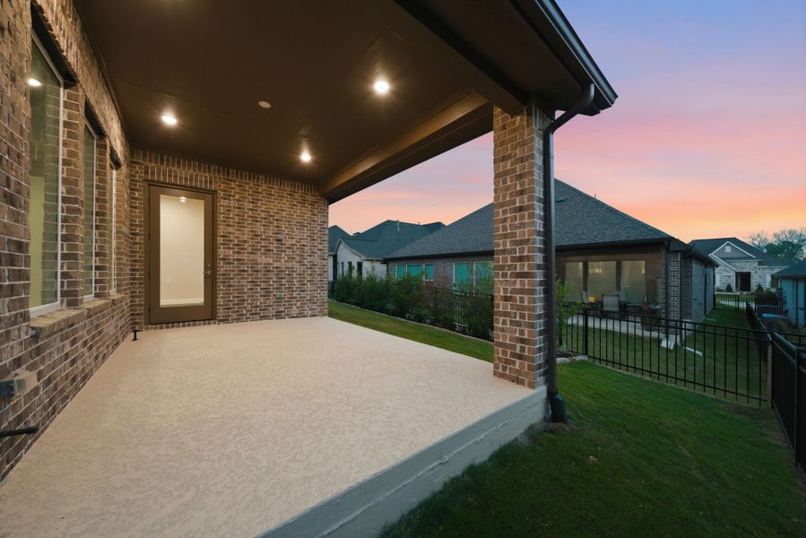 Exterior details and patio area of a home in Chambers Creek, Willis (Image 3).