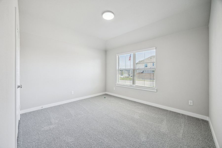Bedroom in the Oscar home plan by Trophy Signature Homes – REPRESENTATIVE PHOTO Bedroom in the Oscar home plan by Trophy Signature Homes – REPRESENTATIVE PHOTO