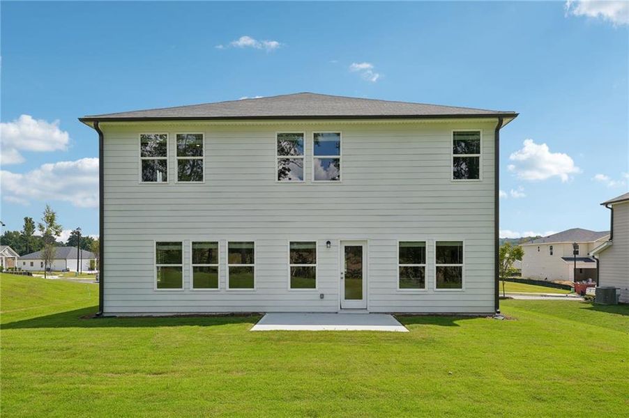 Exterior details and patio area of a home in Northwoods at Mirror Lake, Villa Rica (Image 27).