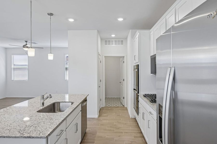 Furnished interior view inside a new home in Mandarina Reserve, Marana (Image 10).