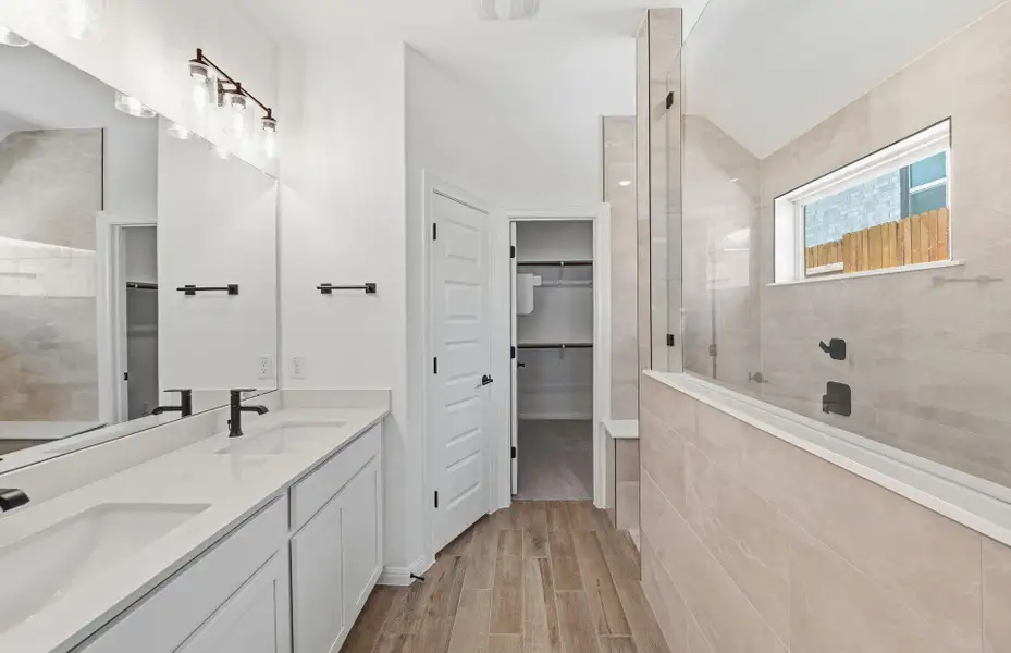 Furnished interior view inside a new home in West Cypress Hills, Spicewood (Image 8).