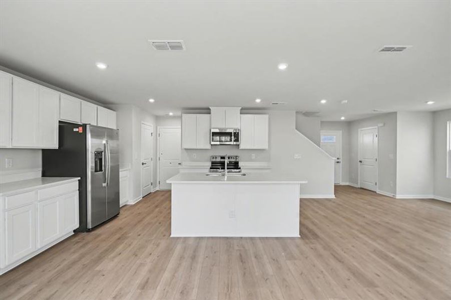 Furnished interior view inside a new home in Sterling Oaks, Ash (Image 4).