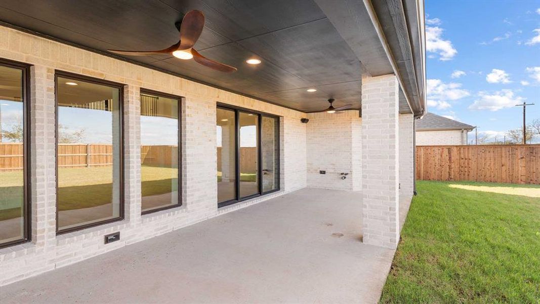 Exterior details and patio area of a home in North Sky 65', Celina (Image 2).