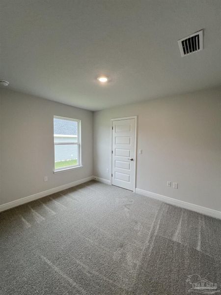 Spacious, unfurnished interior of a new home in Pine Top, Cantonment (Image 9).