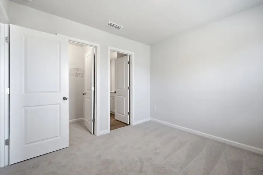 Spacious, unfurnished interior of a new home in Carpenter Falls, Durham (Image 36).
