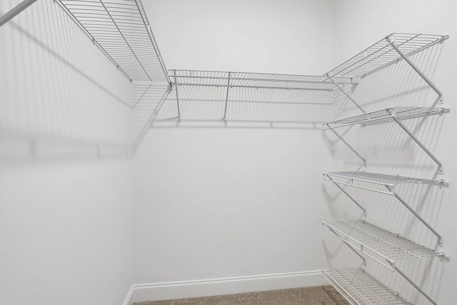Primary Walk-in Closet Primary Walk-in Closet