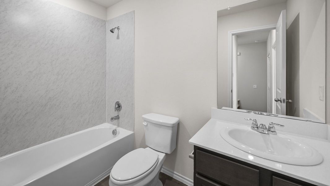Representative furnished interior of a home built from the Zavalla by D.R. Horton in Blaire Lake, Tyler (Image 10).