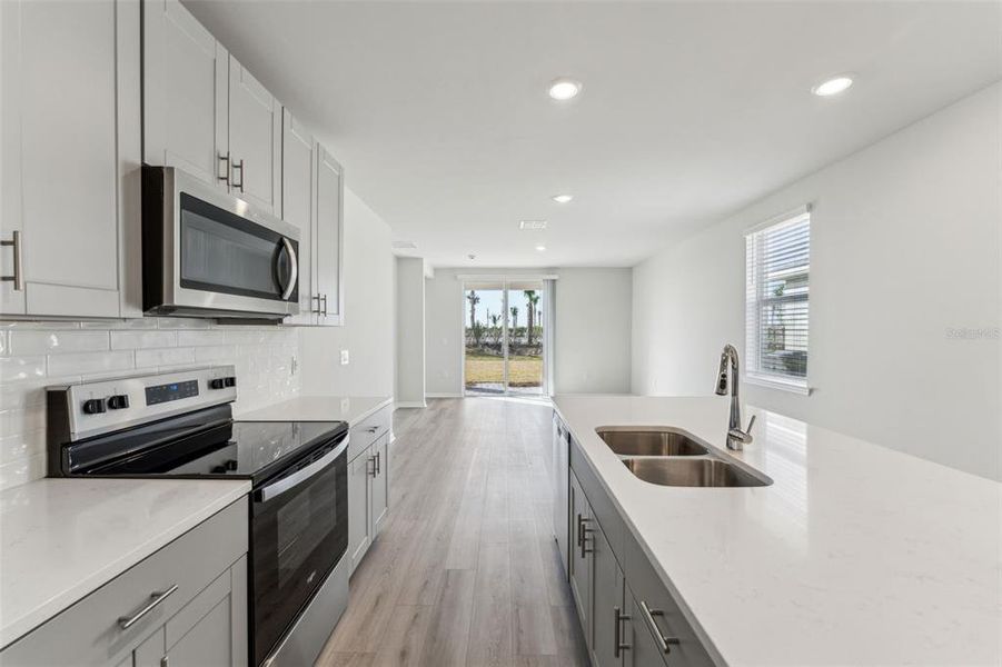 Furnished interior view inside a new home in Crescent Lakes - Premier Series, Punta Gorda (Image 12).