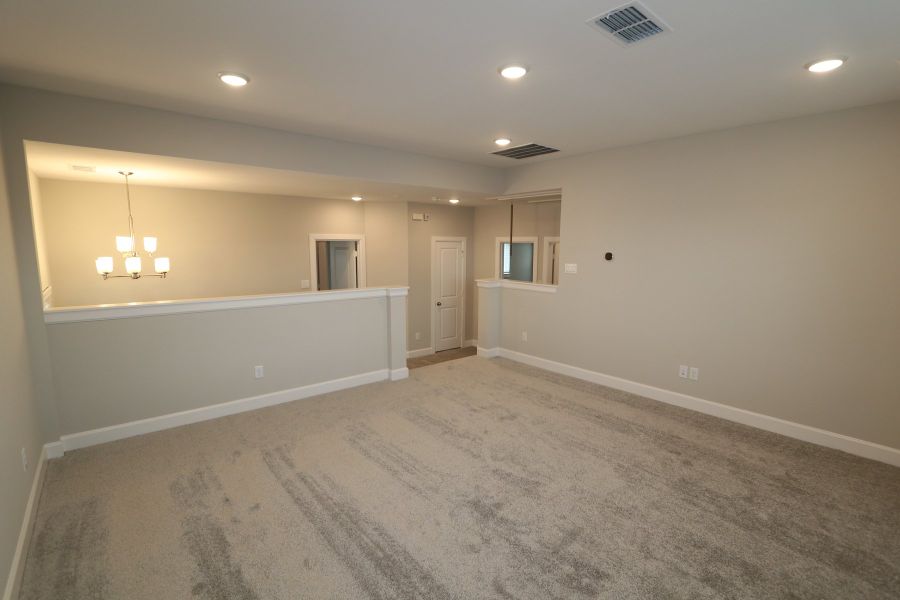 Spacious, unfurnished interior of a new home in Indigo 50’ Homesites, Richmond (Image 8).