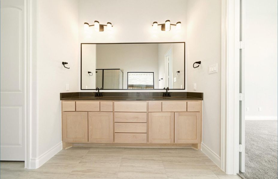Furnished interior view inside a new home in Bridgeland 60′, Cypress (Image 14).