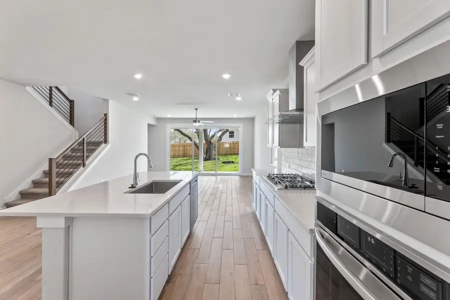 Representative furnished interior of a home built from the Alto by Hakes Brothers in The Woodlands, Mico (Image 3).