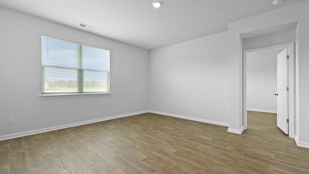 Spacious, unfurnished interior of a new home in Pine Hills at Cane Bay, Summerville (Image 16).
