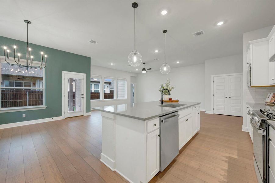 Kitchen (Staged) - Dining Area - Family Room Kitchen (Staged) - Dining Area - Family Room