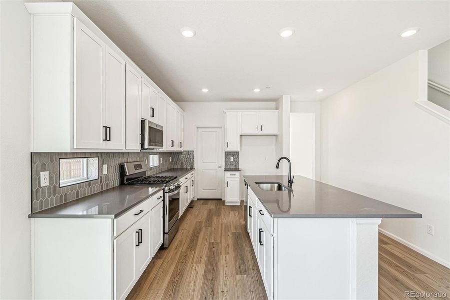 Furnished interior view inside a new home in , Commerce City (Image 11).