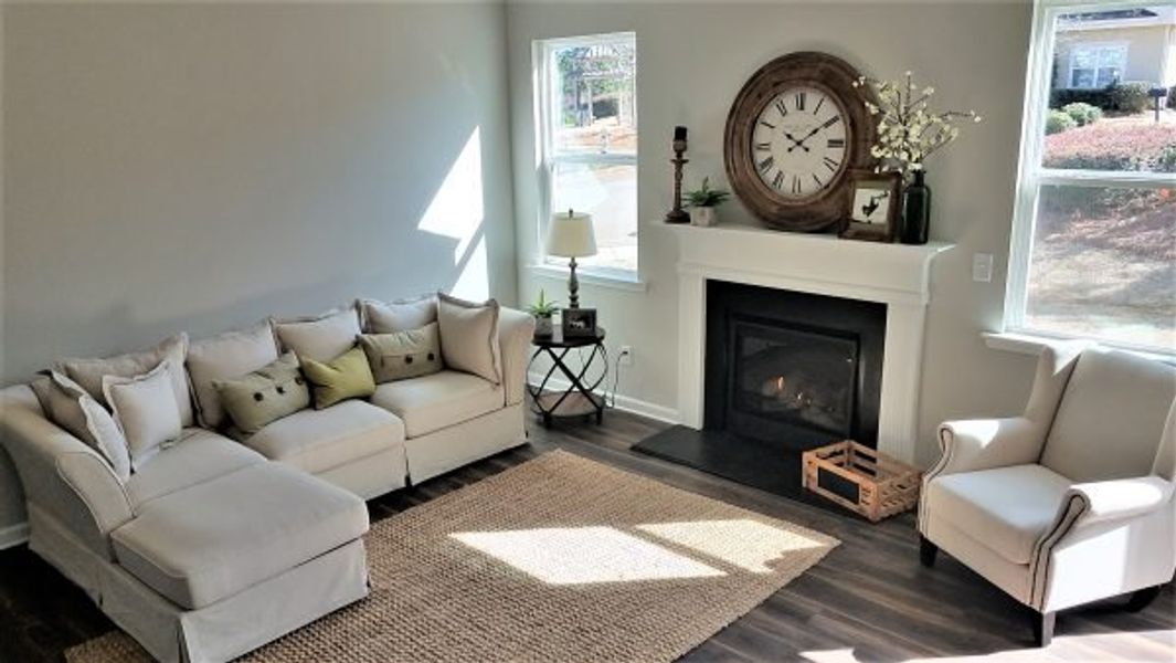 Representative furnished interior of a home built from the Emory by Piedmont Residential in Falls Creek, Flowery Branch (Image 8).