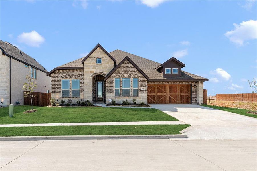 Front exterior of a new home in The Oaks, Red Oak, TX, highlighting curb appeal (Image 1). Front exterior of a new home in The Oaks, Red Oak, TX, highlighting curb appeal (Image 1).