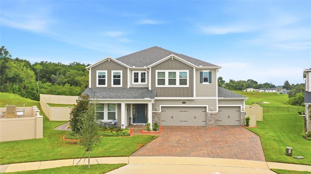 Front exterior of a new home in , Apopka, FL, highlighting curb appeal (Image 20).
