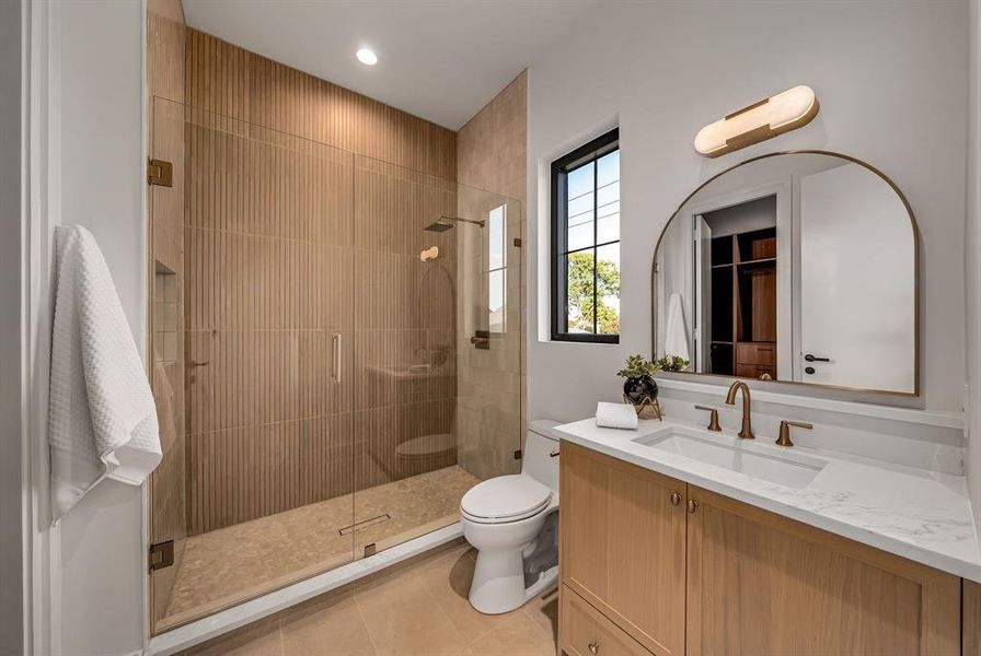 Full bath featuring vanity, a shower stall, light tile patterned floors, and recessed lighting Full bath featuring vanity, a shower stall, light tile patterned floors, and recessed lighting