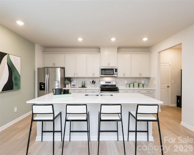 Photo is not of the actual home, but is an inspirational photo of builder’s model home and may depict options, furnishings, and/or decorator features that are not included