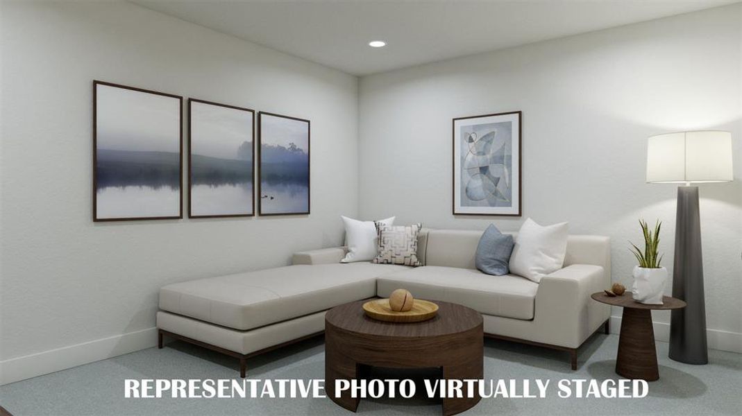 This outstanding media room, paired with a fantastic game room, create the ultimate entertainment area in our Ashland III plan!  REPRESENTATIVE PHOTO VIRTUALLY STAGED