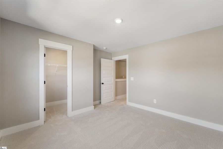 Spacious, unfurnished interior of a new home in Renaissance Place, Greenville (Image 13).