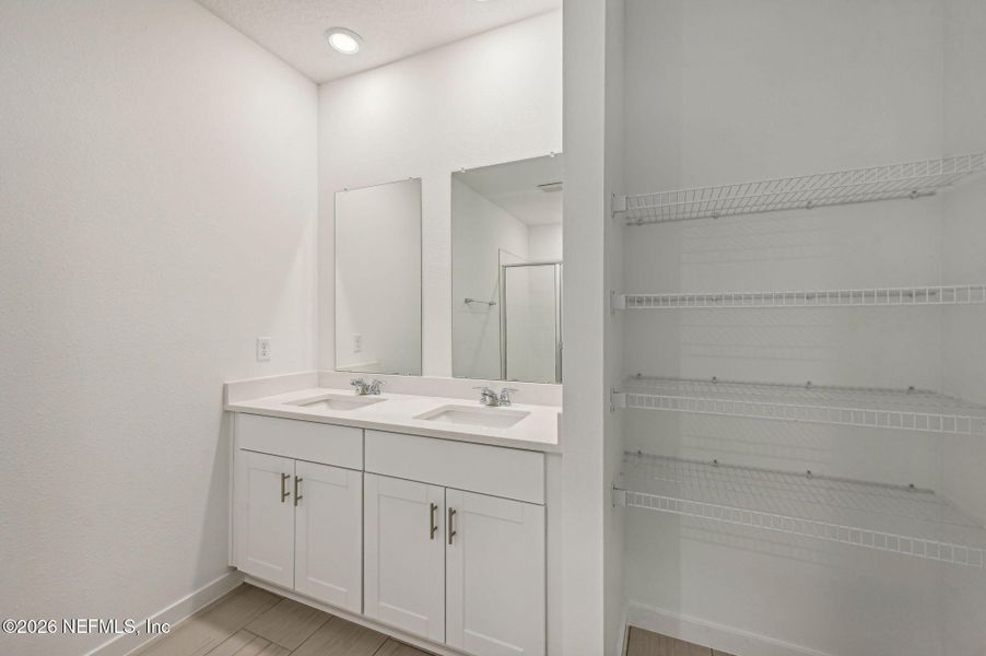 Furnished interior view inside a new home in Lakes at Bella Lago - Signature Series, Green Cove Springs (Image 6).
