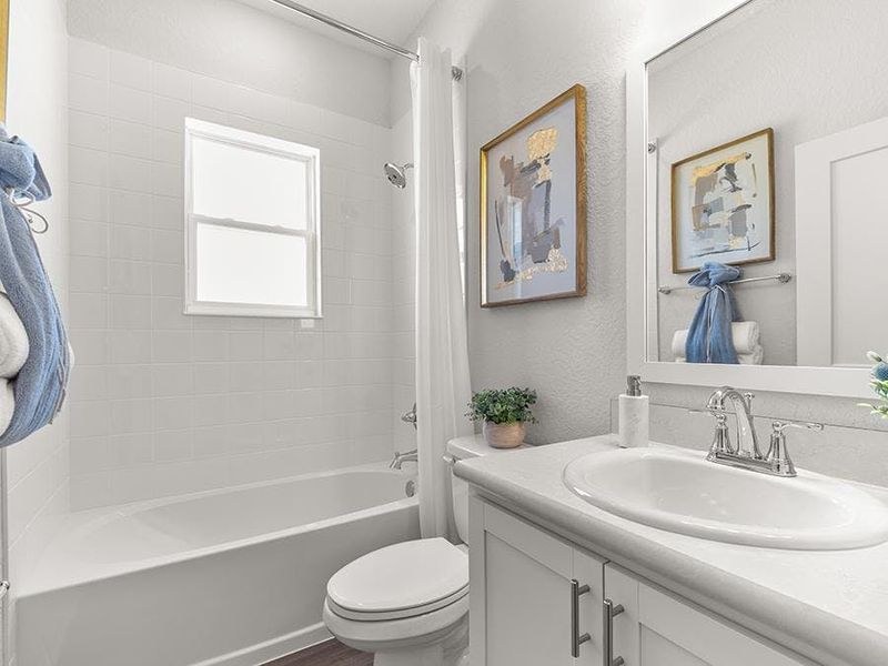 A hall bath serves bedrooms 2 and 3 - Westin II by Highland Homes