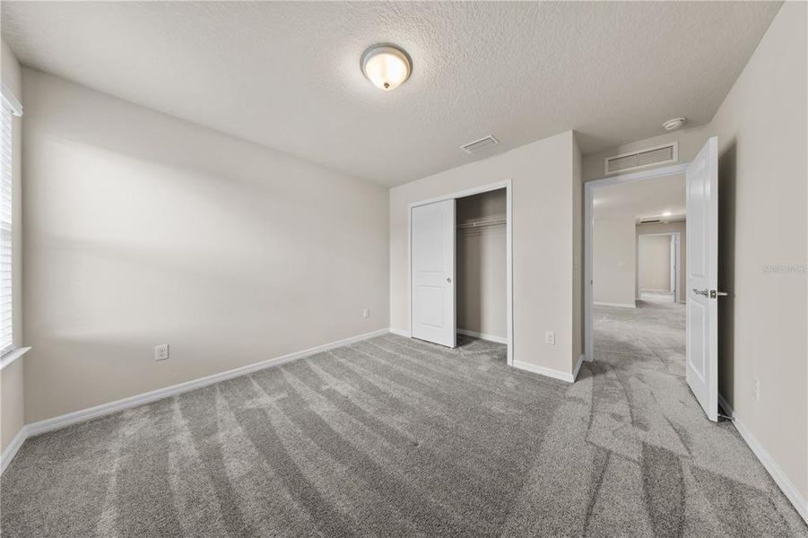 Spacious, unfurnished interior of a new home in EverBe, Orlando (Image 36).
