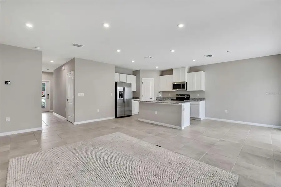 Furnished interior view inside a new home in , Sumterville (Image 10).