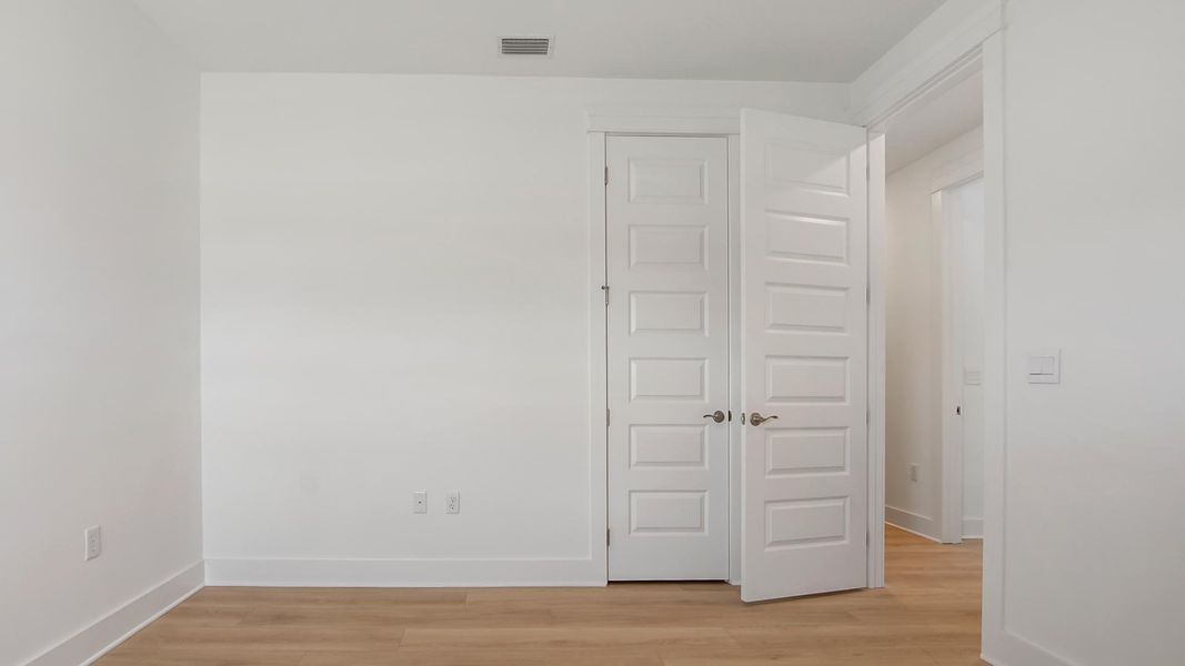 Spacious, unfurnished interior of a new home in Breakfast Point East Phase II, Panama City Beach (Image 32). Spacious, unfurnished interior of a new home in Breakfast Point East Phase II, Panama City Beach (Image 32).
