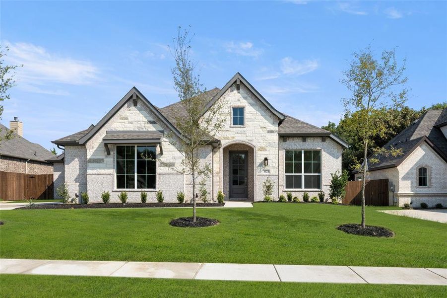 Front exterior of a new home in Massey Meadows, Midlothian, TX, highlighting curb appeal (Image 2). Front exterior of a new home in Massey Meadows, Midlothian, TX, highlighting curb appeal (Image 2).