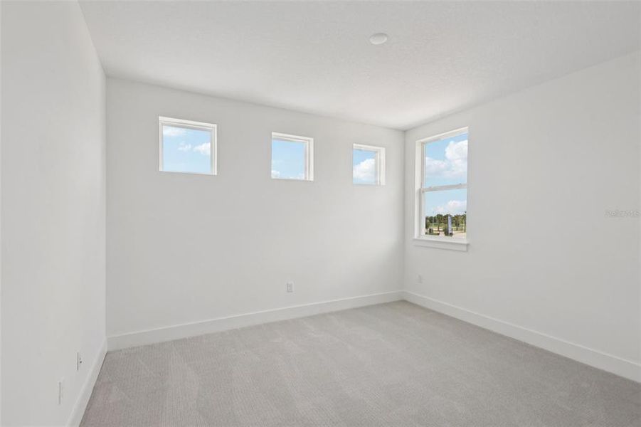 Spacious, unfurnished interior of a new home in Lagoon Residences at Epperson, Wesley Chapel (Image 22).