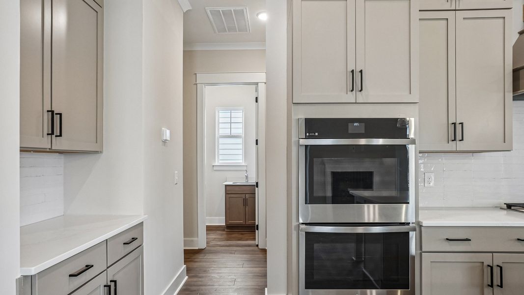 View of utility and garage access from the kitchen